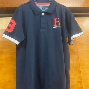 Tommy Hilfiger polo navy blue and red, boys size 12-14. Like new.